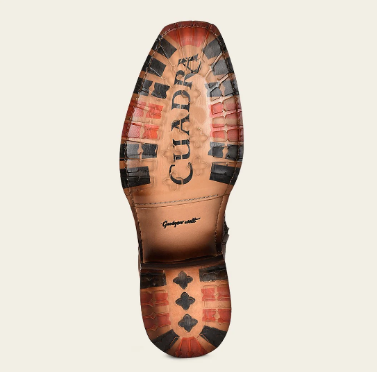 Bota urbana en piel genuina de pitón para caballero.