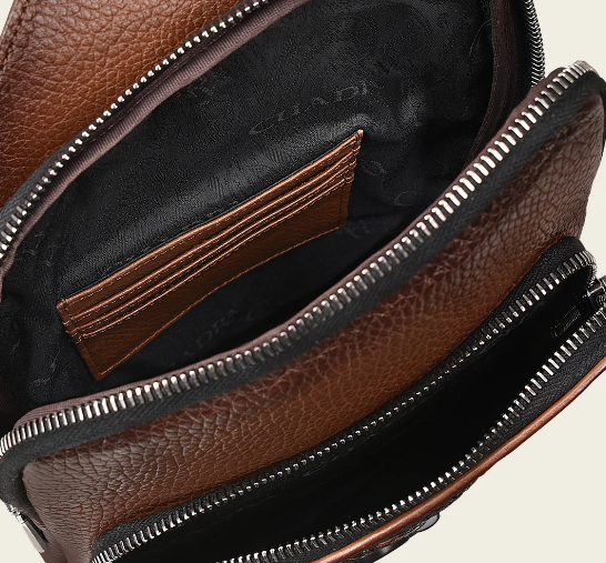 Bandolera en piel genuina de pitón para caballero.