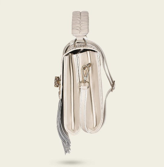 Bolso de mano en piel genuina de pitón para dama.