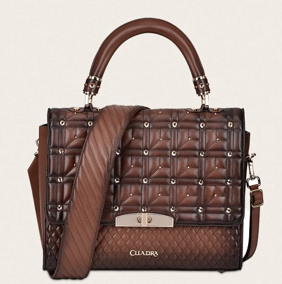 Bolso en piel genuina con cristales.