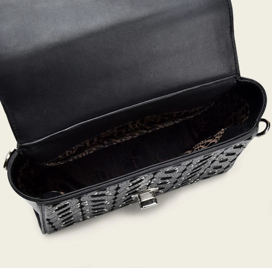 Bolso de mano en piel genuina de mantarraya para dama.