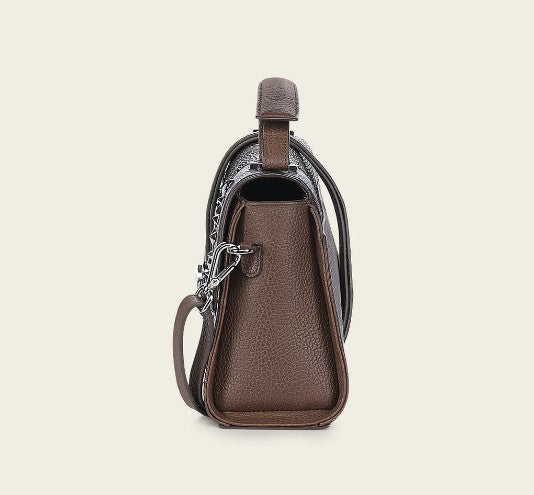 Bolso de mano en piel genuina de pitón para dama.