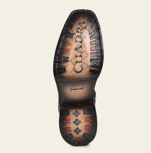 Bota urbana en piel genuina de pitón para caballero.