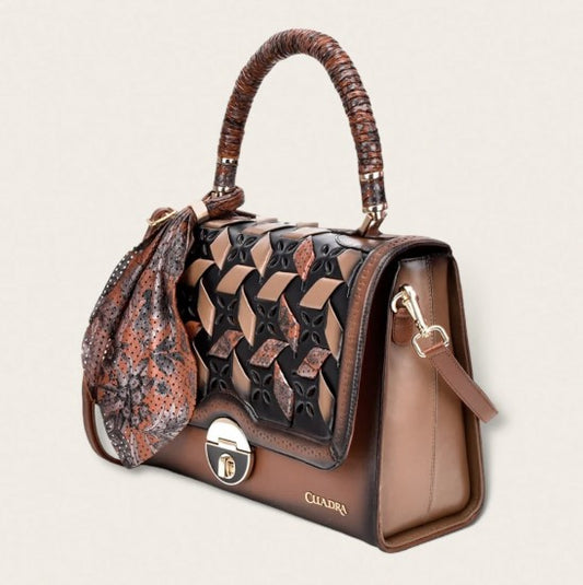 Bolso en piel genuina para dama.