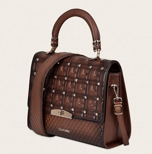 Bolso en piel genuina con cristales.